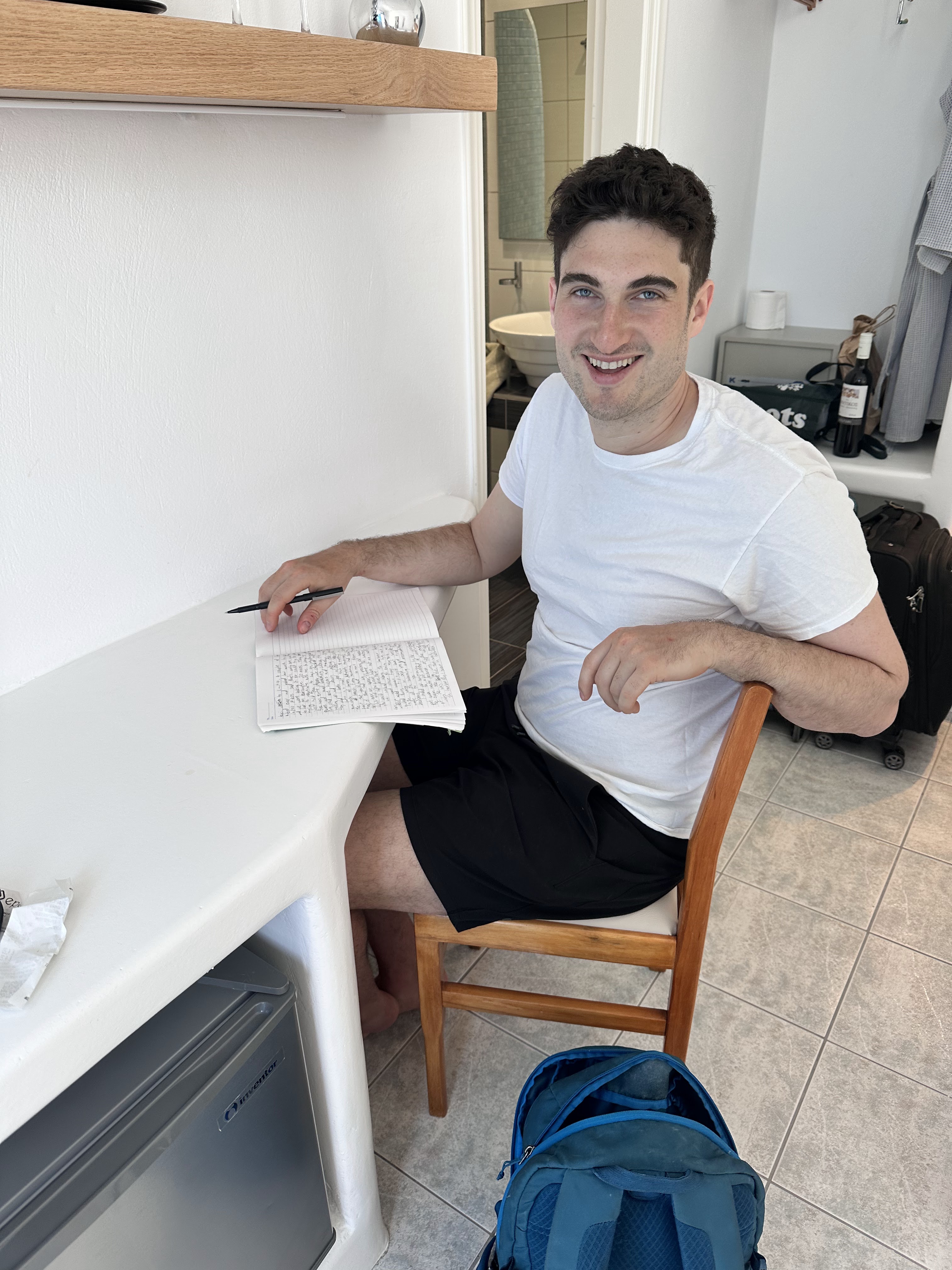 Adam writing in room