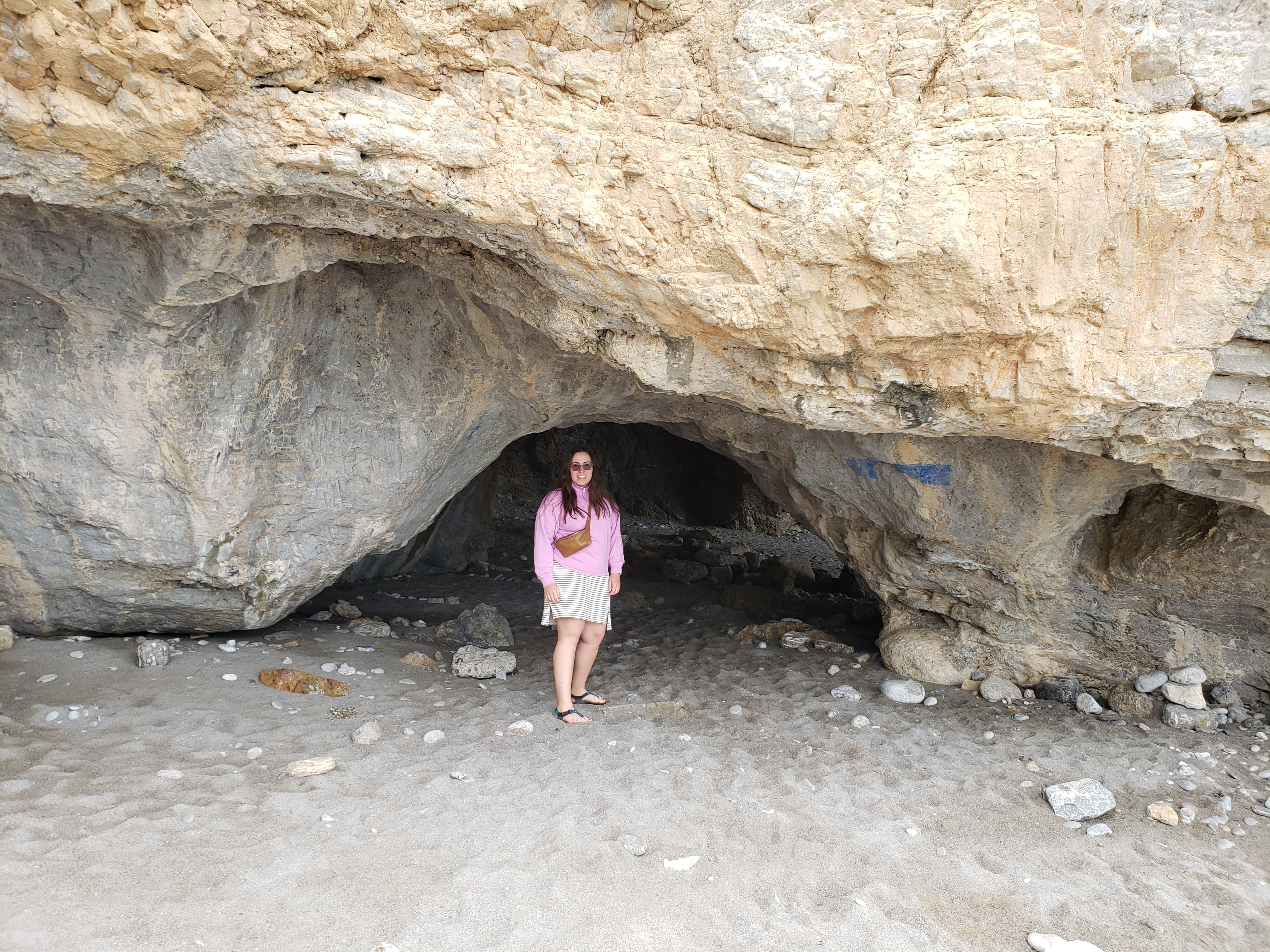 Lizy in front of cave