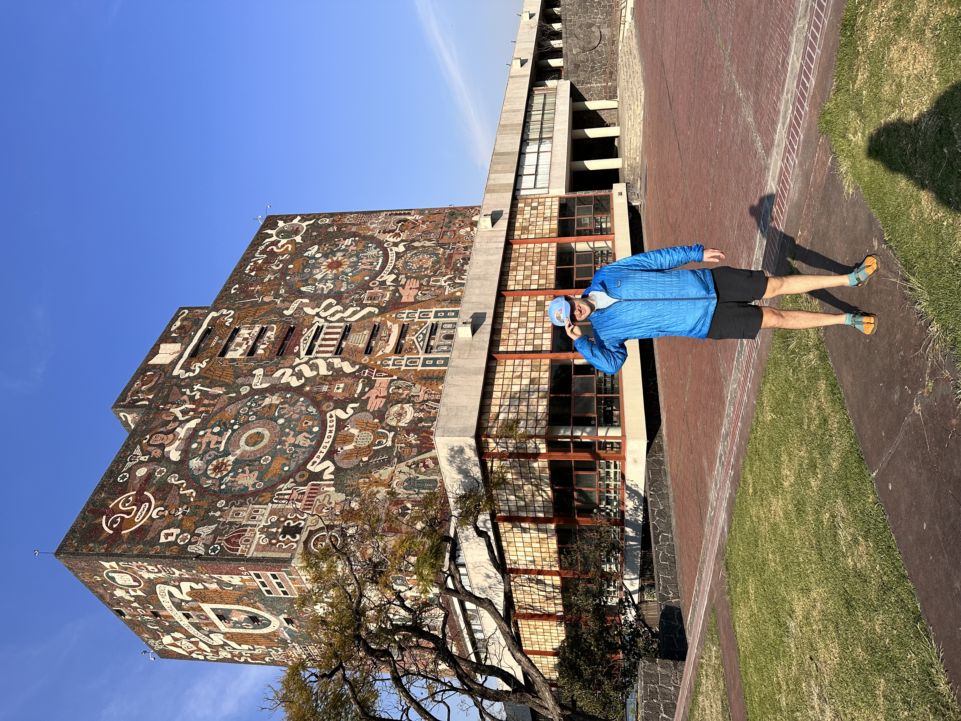 Adam in front of UNAM
